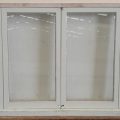 Wooden bi-fold window