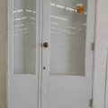 Wooden exterior door with sidelight
