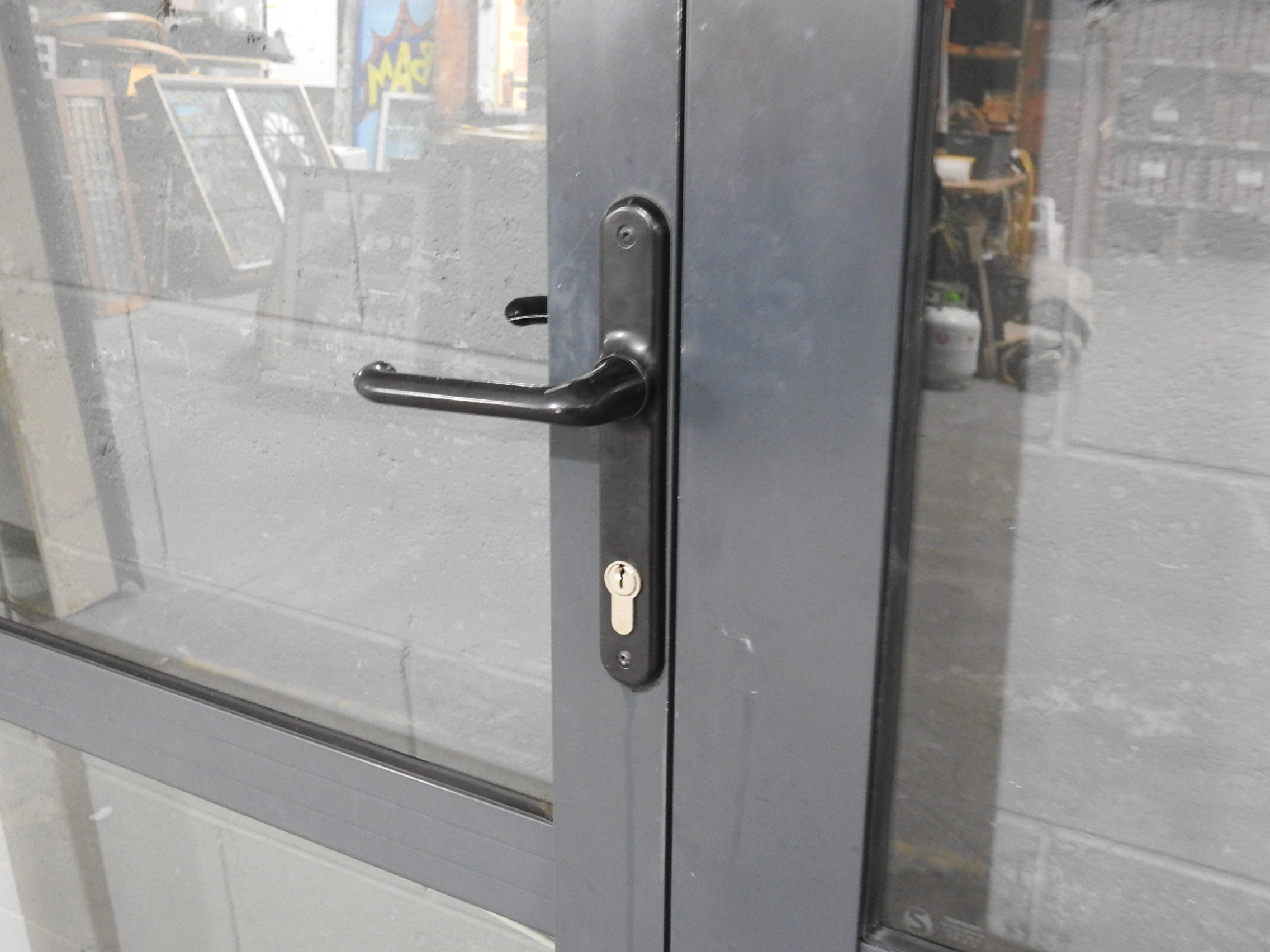Denim Blue Aluminium Bi-Fold Door With Dedicated Door