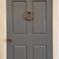 Off white aluminium frame with solid timber Entrance door