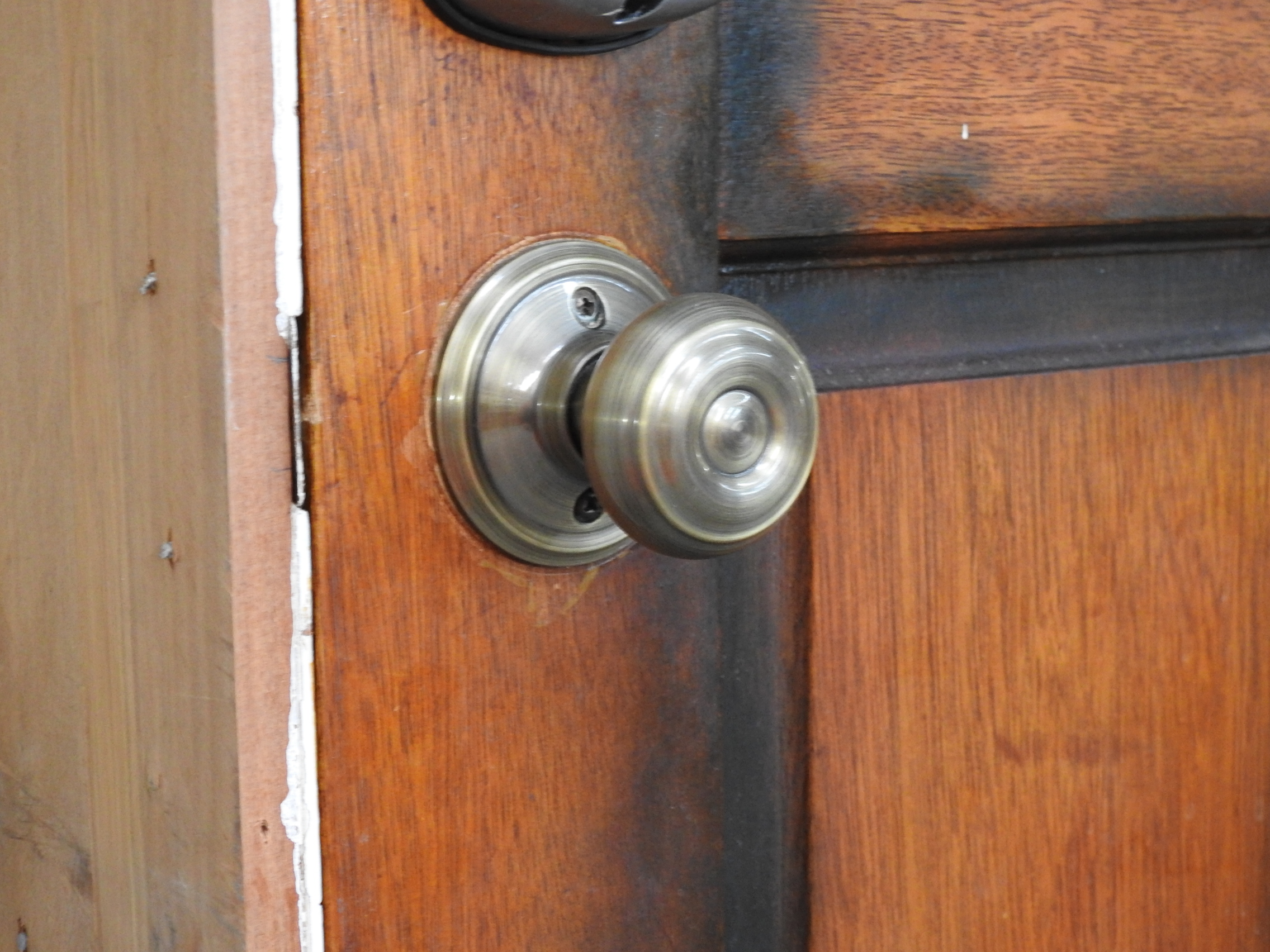 Wooden Exterior Fanlight Door Hung in Frame