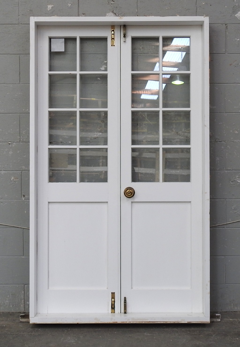 Bungalow Style Wooden French Doors Hung in Frame