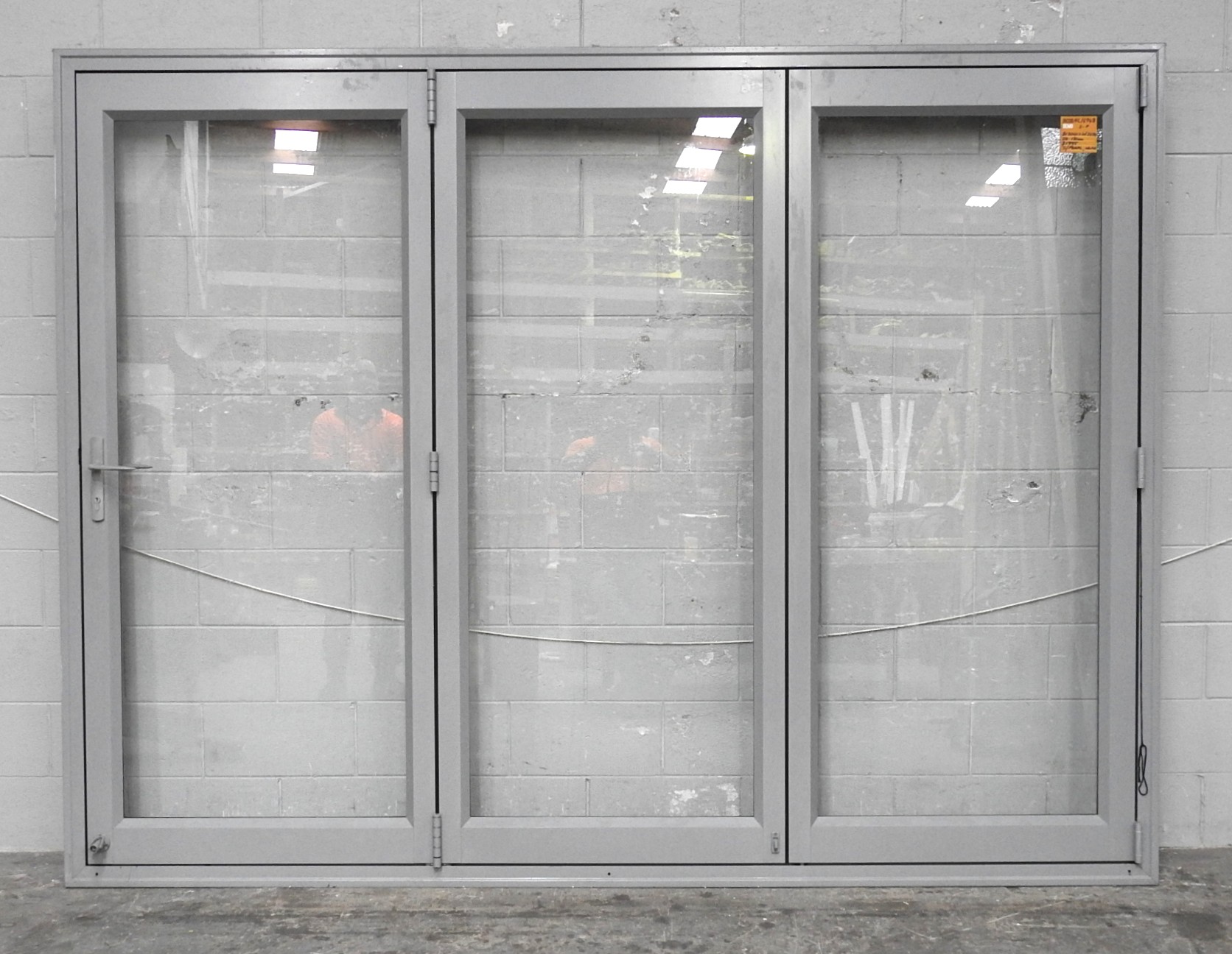 Silver Pearl Aluminium Bi-Fold Doors With Dedicated Door