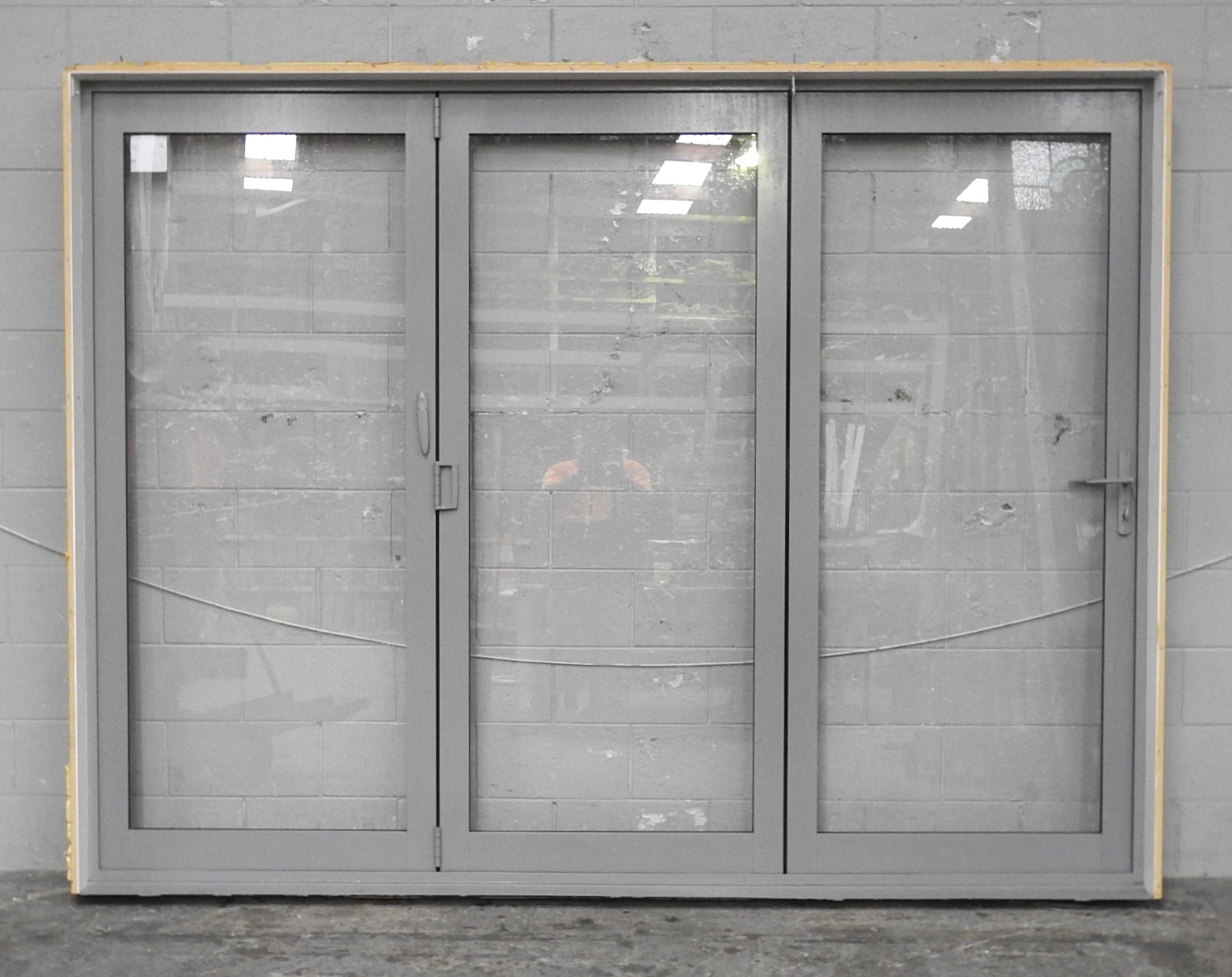 Silver Pearl Aluminium Bi-Fold Doors With Dedicated Door